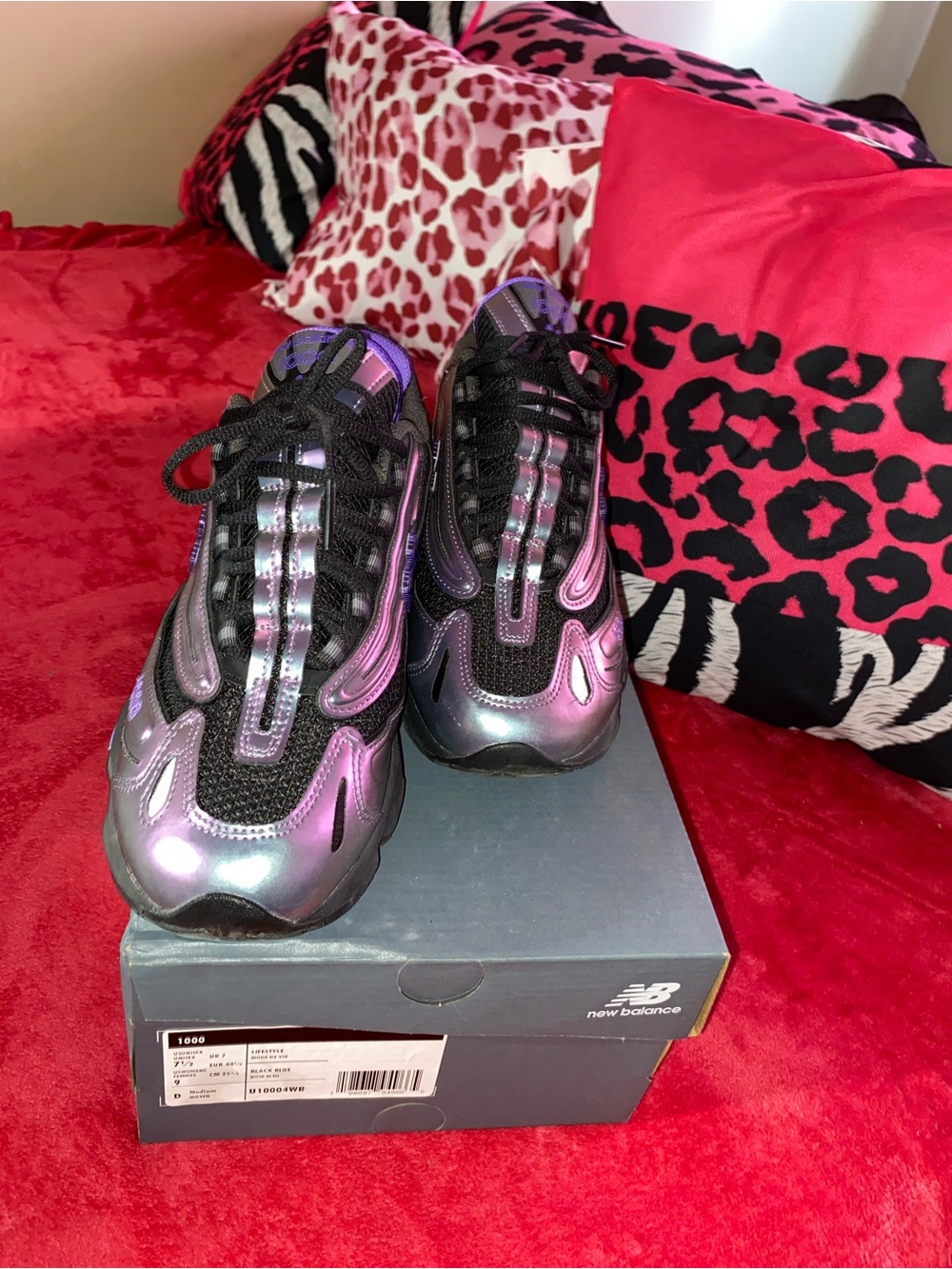 New Balance Women’s Iridescent Purple and Black Sneakers